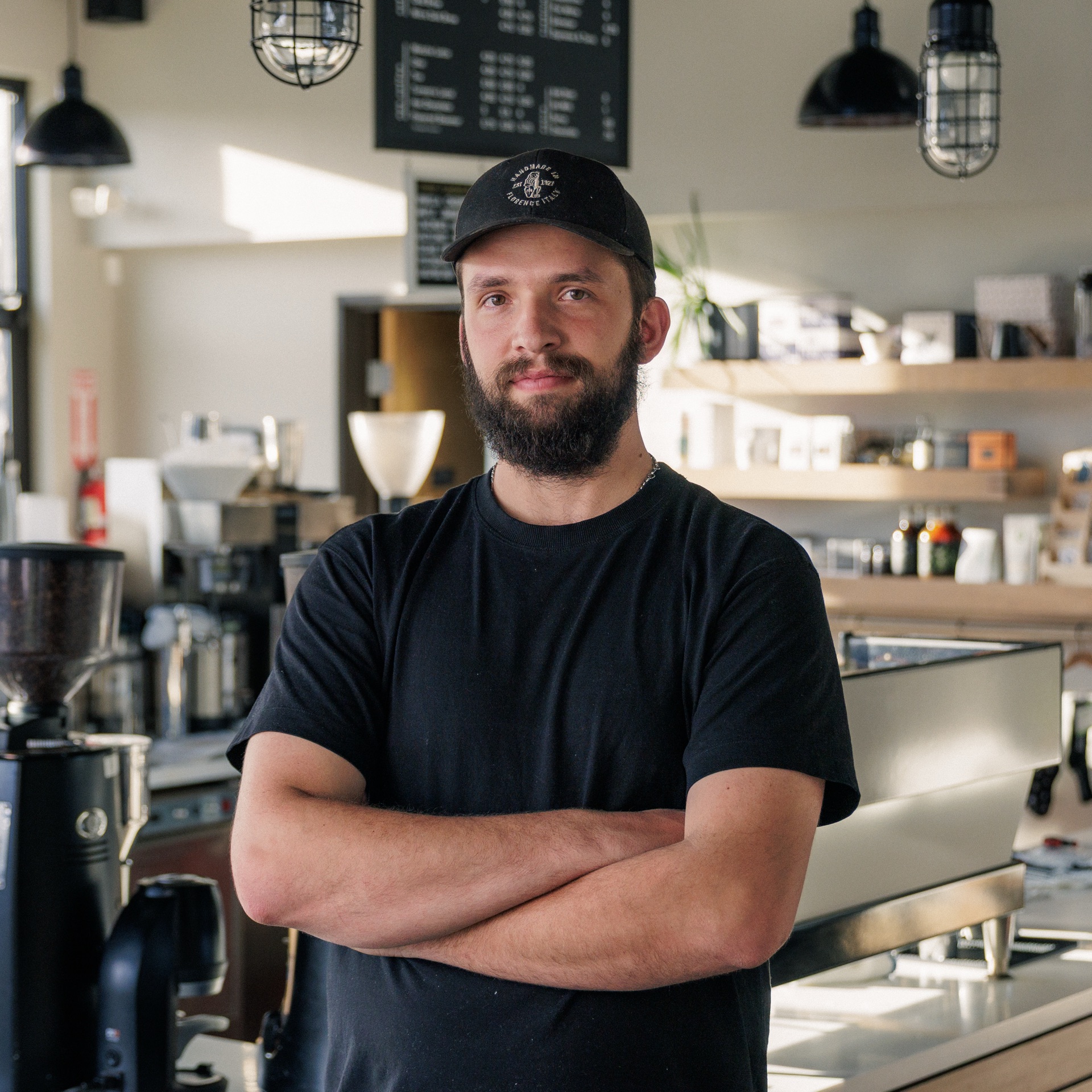 Cameron Baker working at the service counter at Baker's Coffee Service